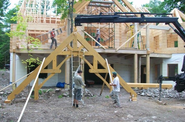Photo of an 1867 Confederation Log Home being constructed