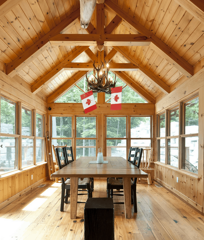 The addition of timber frame accents gives this porch a dramatic presence.