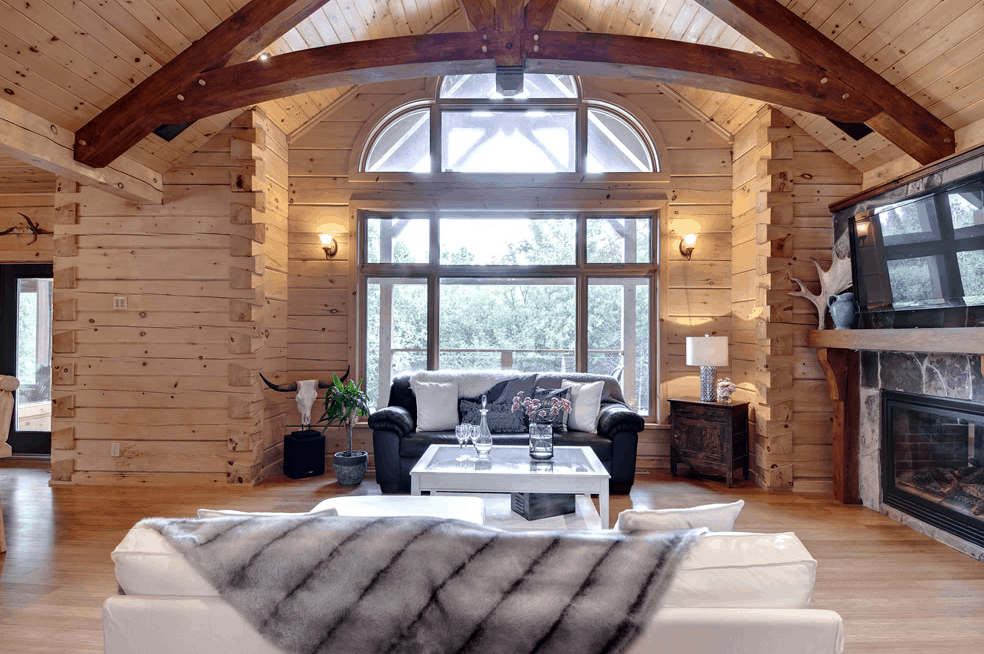 Decorative timber frame - a gorgeous enhancement in this Confederation Log & Timber Frame home